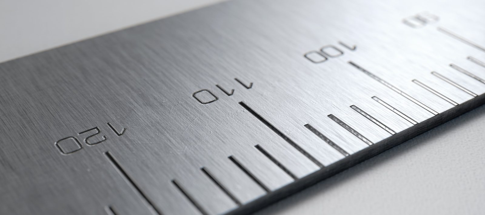 Close-up photo of a metal ruler.