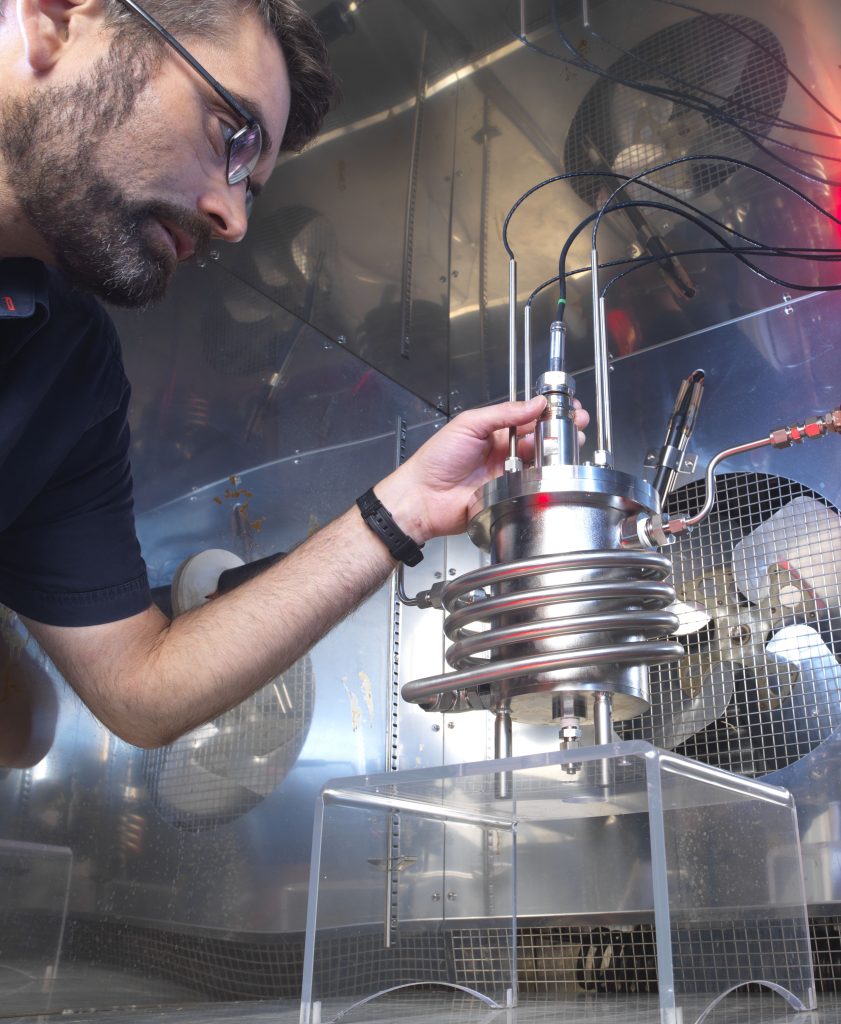 An NPL scientist uses a humidity subchamber